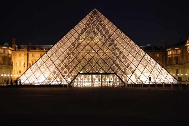 Outside the Louvre at night