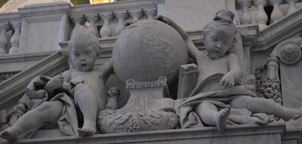 Two cherub-esque figures on the staircase from the Library of Congress lobby