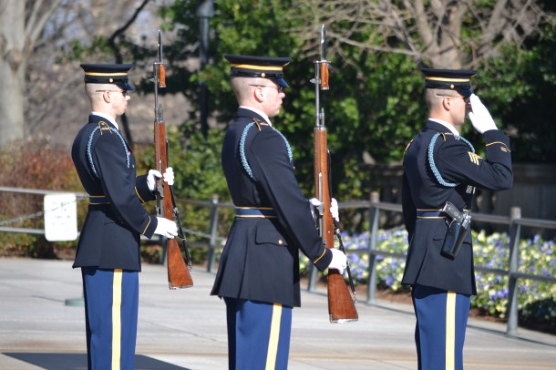 The soldiers salute the Tomb of the Unknowns