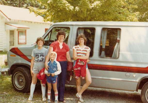 The kids with mom - dad taking the picture - on a road trip