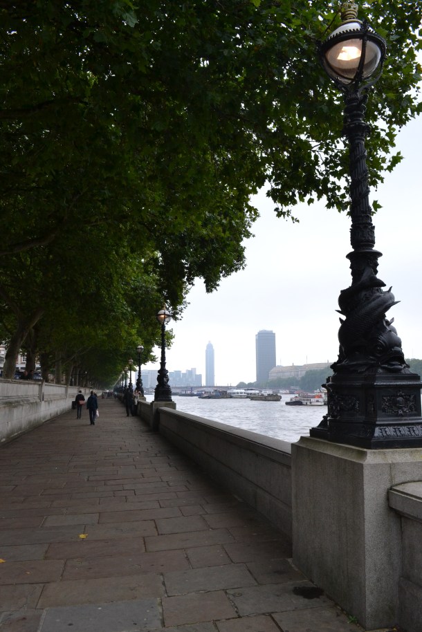 Walking along the Thames across from Parliament